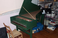 harpsichord in squalid living room